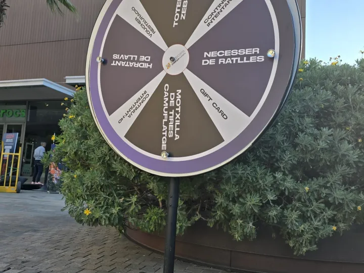 Purple prize wheel at an open-air shopping centre