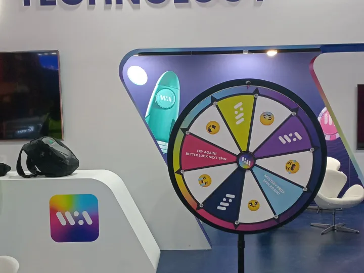 Custom floor-standing prize wheel on a tech company's stand