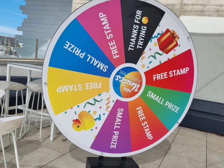 Giant multicolour prize wheel on a terrace
