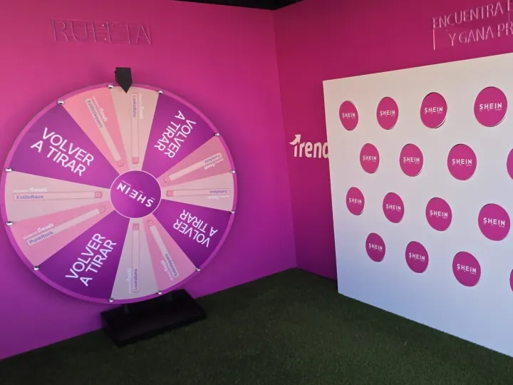 Pink giant prize wheel in a brand space