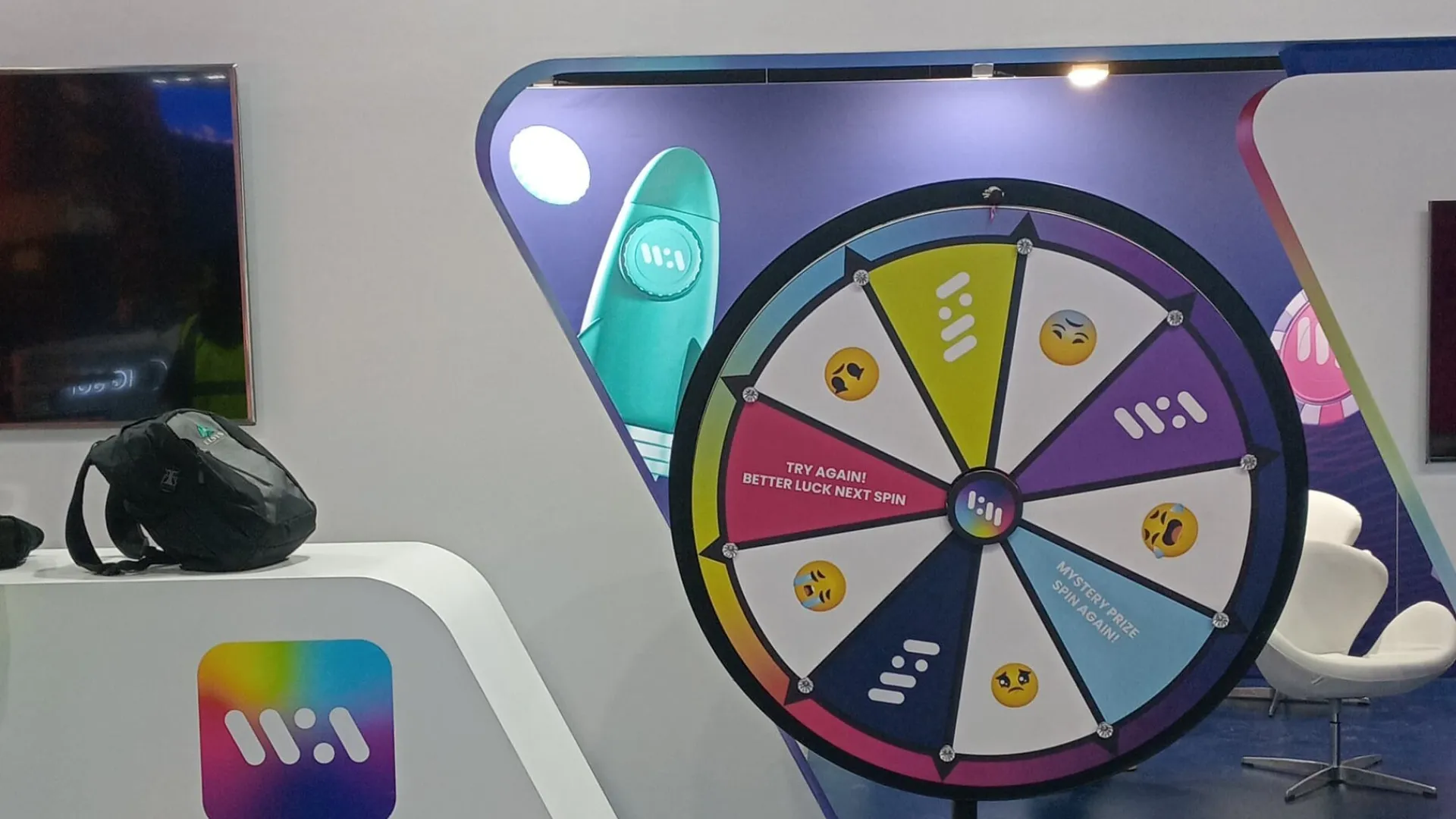 Custom floor-standing prize wheel on a tech company's stand