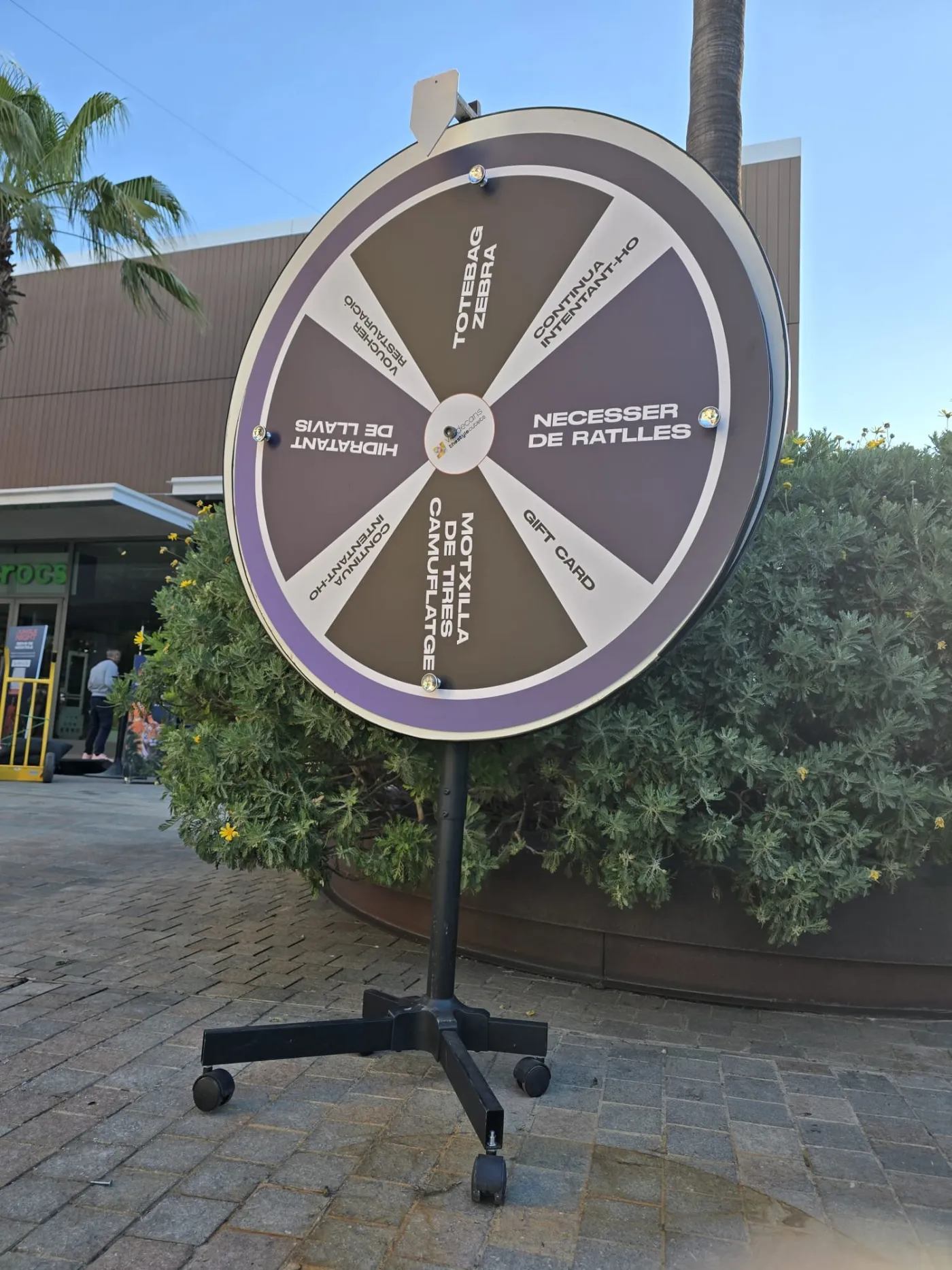 Purple prize wheel at an open-air shopping centre