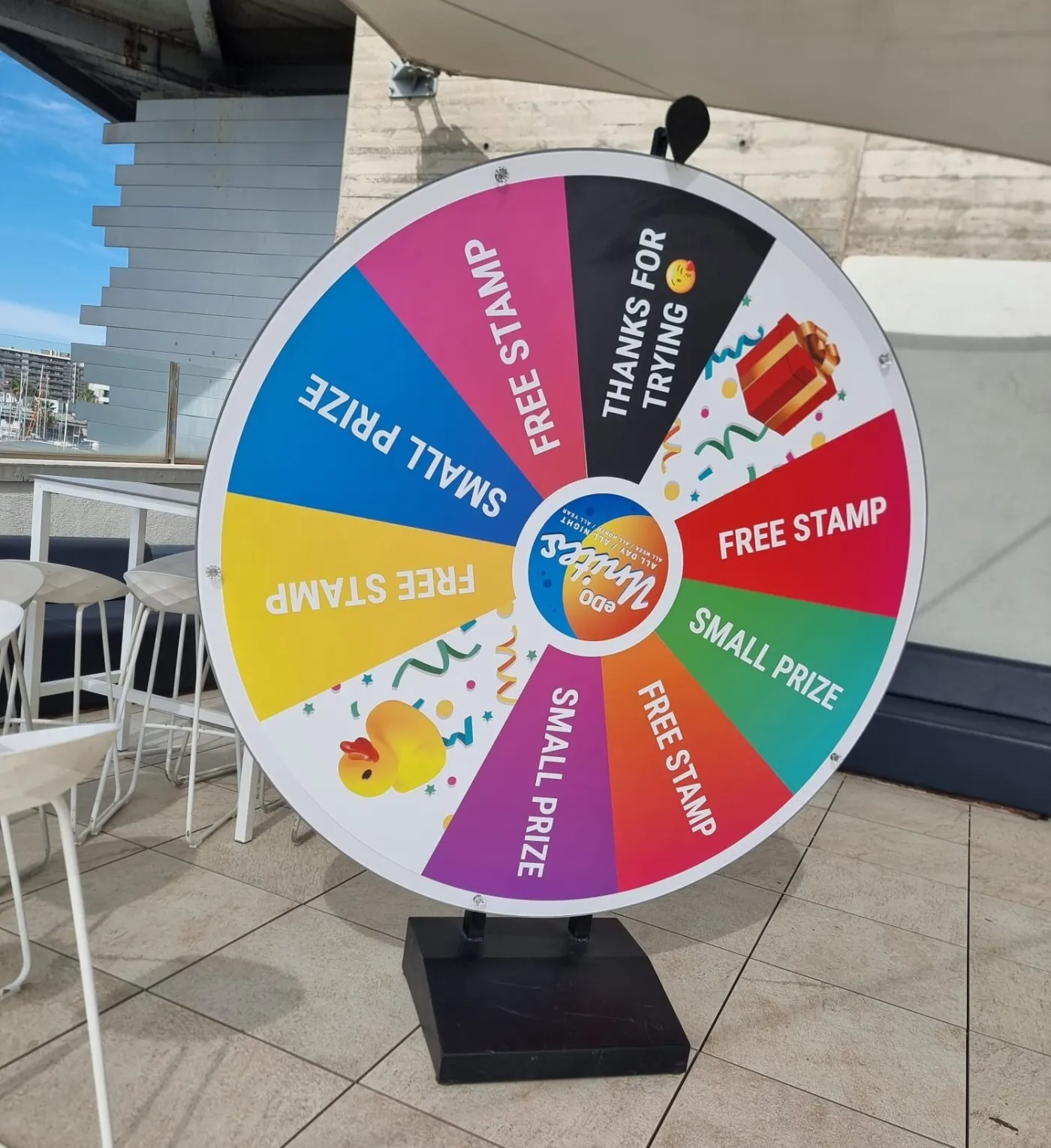Giant multicolour prize wheel on a terrace