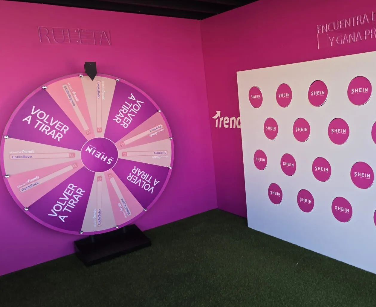 Pink giant prize wheel in a brand space
