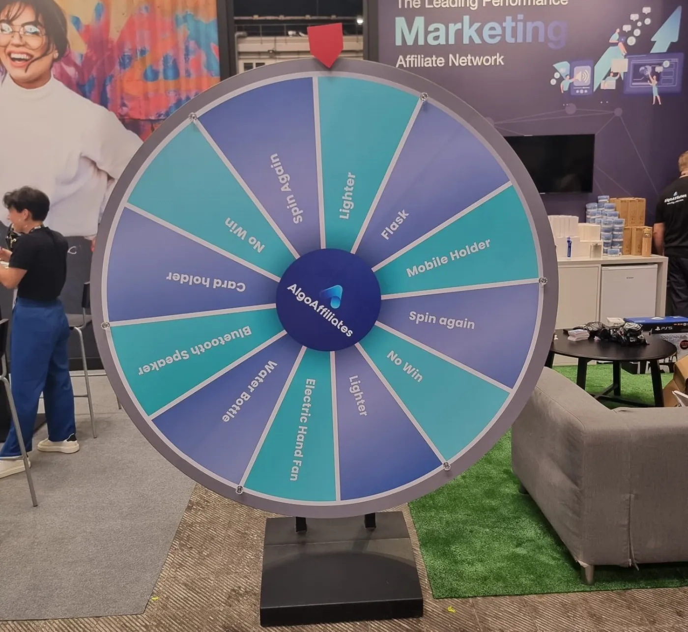Turquoise giant prize wheel at a digital marketing fair